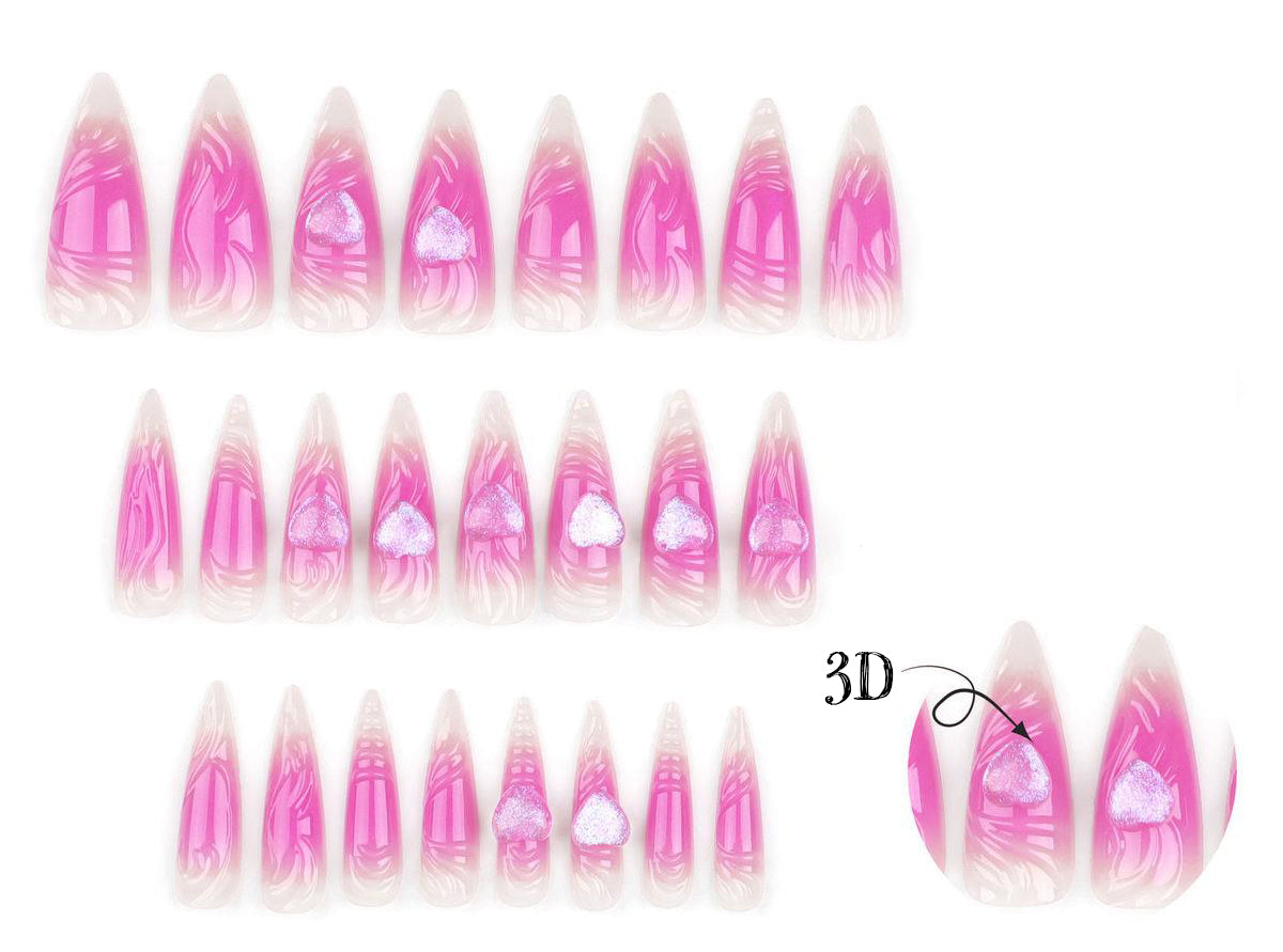 long stiletto length false nails featuring 3D pink and clear sculpted swirls and ripples with pink glitter hearts, displayed on a white background.