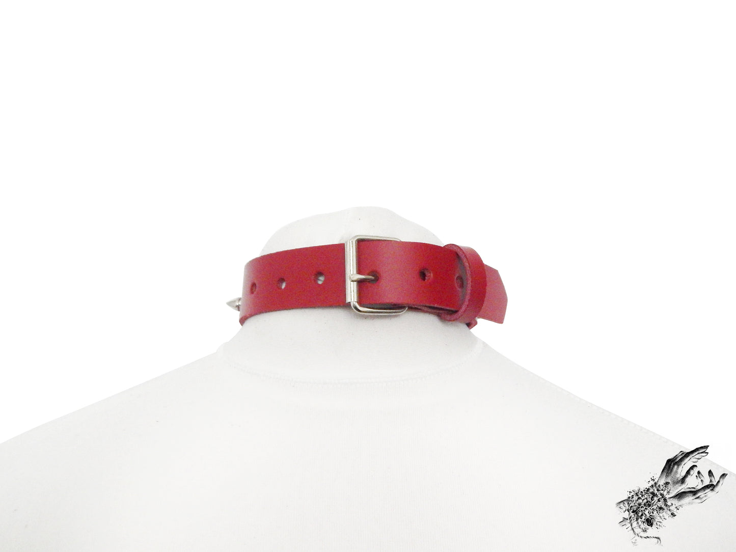 Rear view of a red leather choker showing the silver buckle and adjustable holes on a white mannequin bust