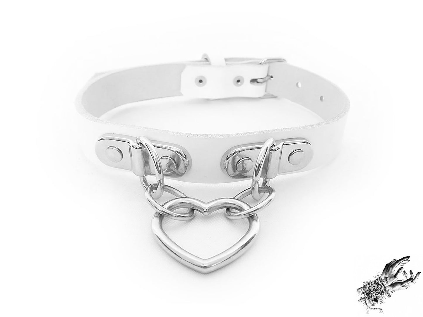 White leather choker with a silver heart-shaped pendant on a white background