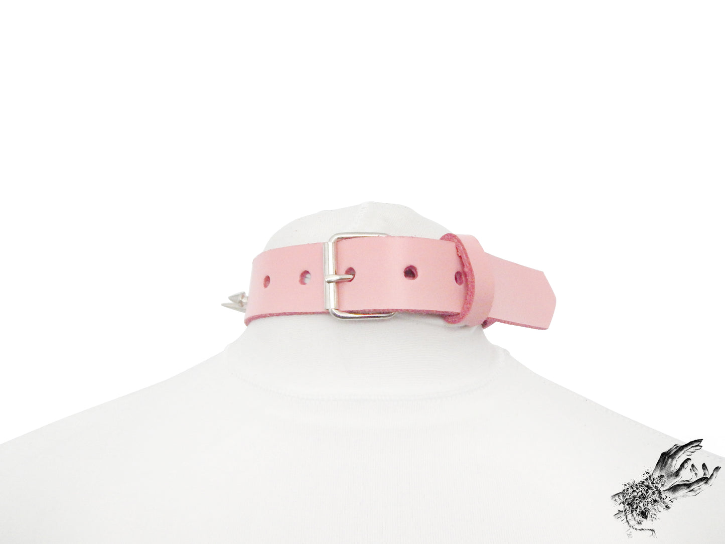 Rear view of pink leather collar showing the silver buckle and adjustable holes on a white mannequin bust