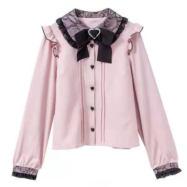 Pink and black long sleeved blouse featuring a lace Peter Pan style collar, ruffled shoulders, pintucks, black heart shaped buttons and detachable bow brooch. Displayed on a white background.