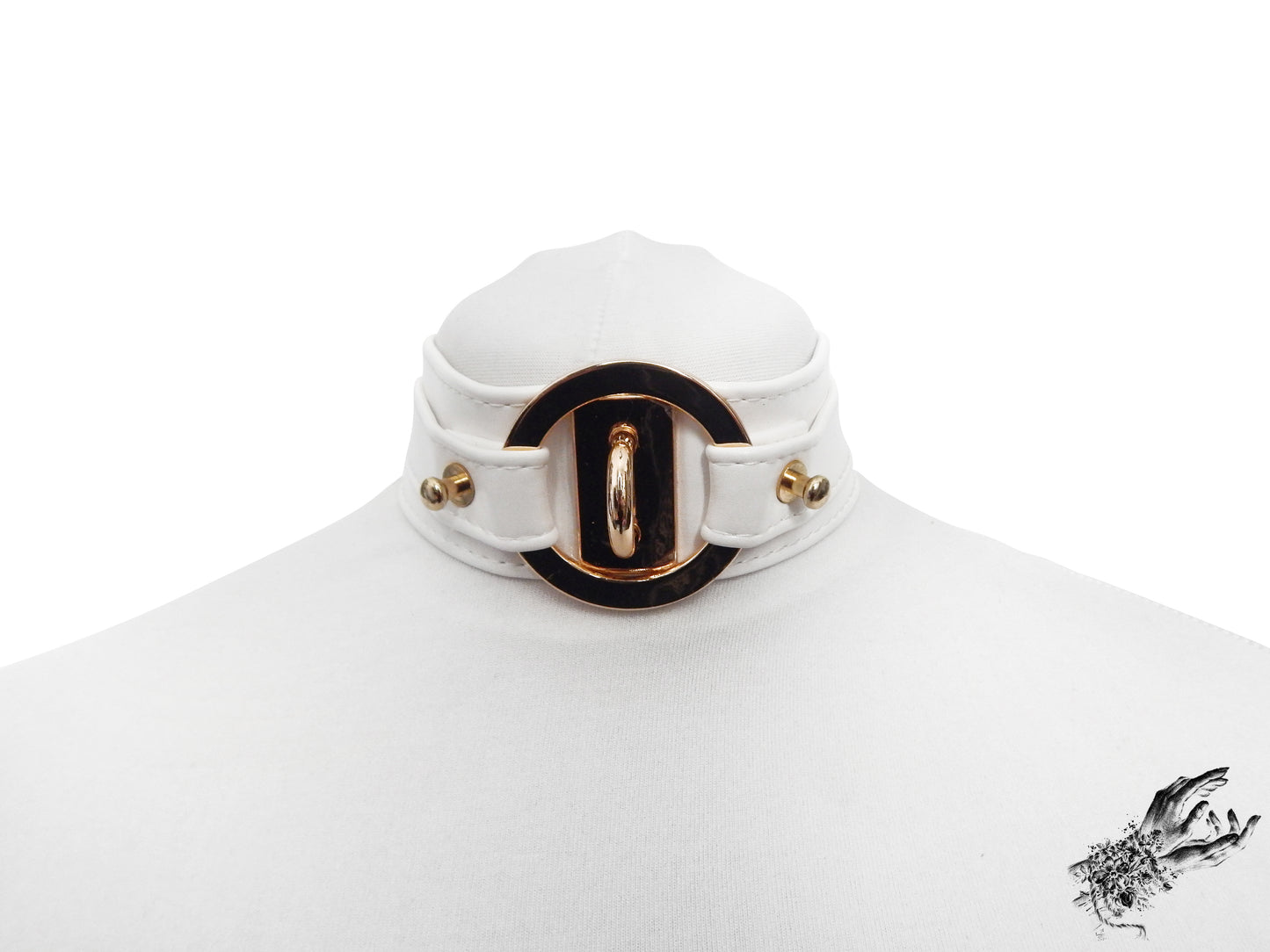 White vegan leather choker featuring central gold tone hardware including an O-ring and detached heart padlock. Displayed on a white mannequin bust against a white background.