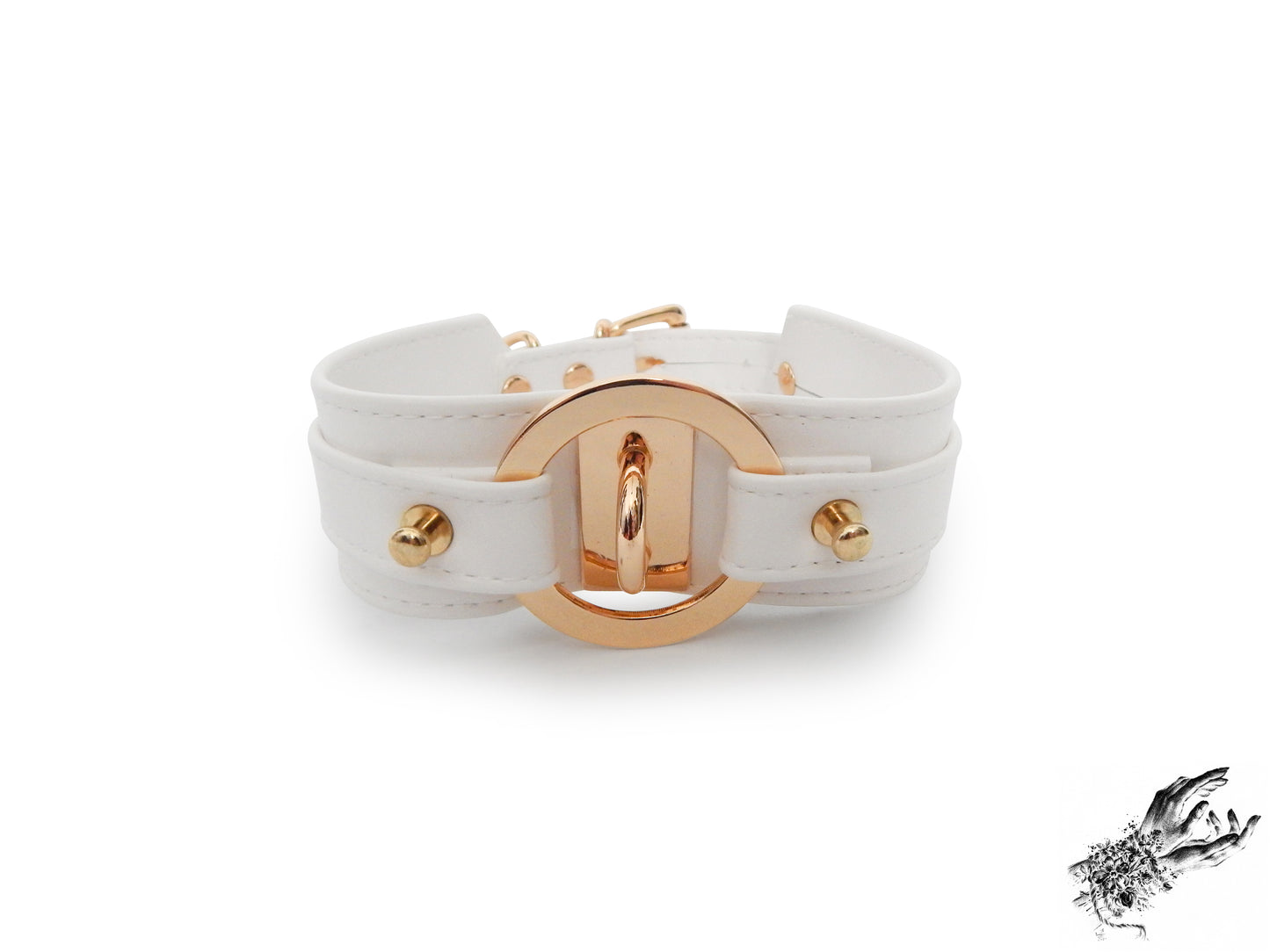 White faux leather choker featuring central gold tone hardware including an O-ring and removable heart padlock. Displayed on a white background.