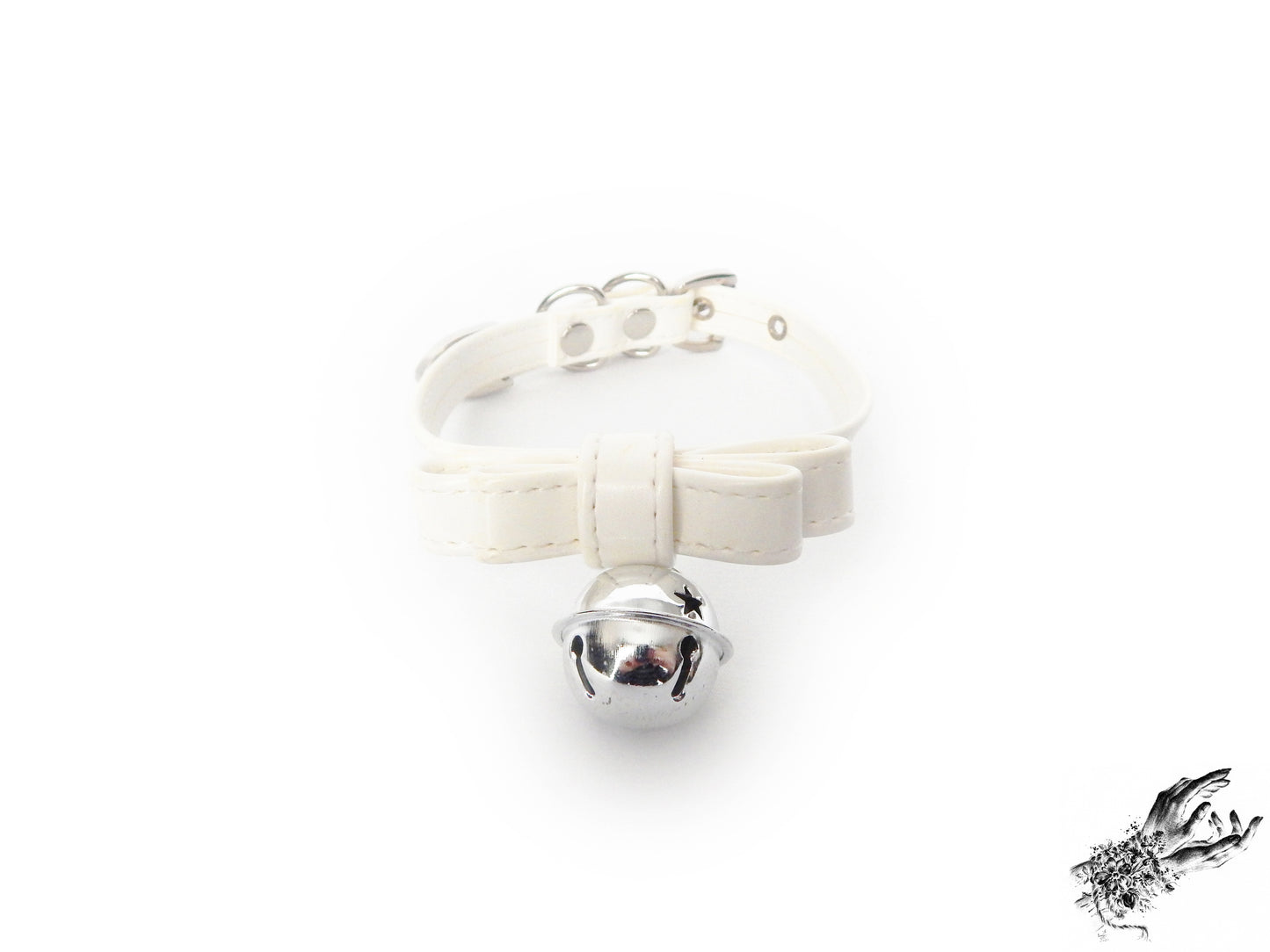 White faux leather bow choker featuring a silver bell design, with adjustable buckle at the back