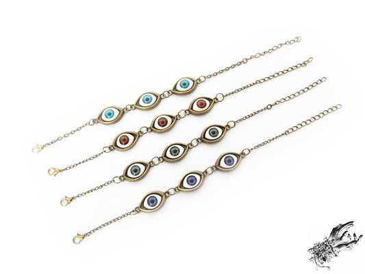 Antique style evil eye cameo bracelets featuring a variety of iris colours in blue, green and brown displayed on a white background