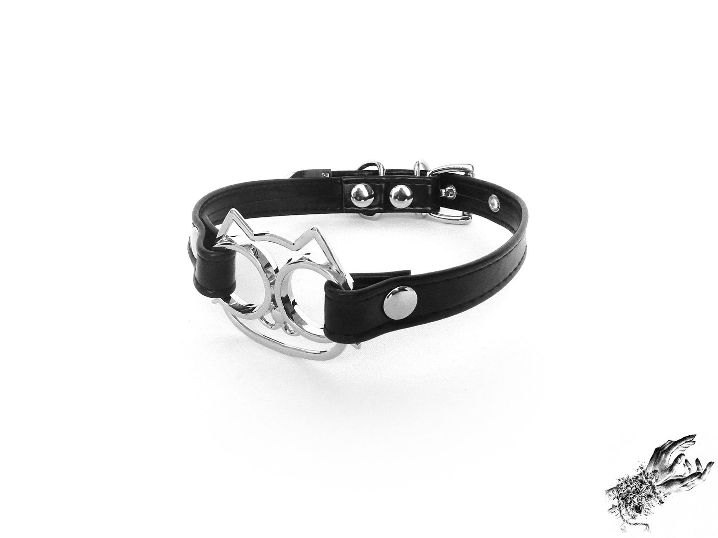 Black faux leather choker featuring a central silver cat shaped pendant with an adjustable stainless steel plated buckle at the back