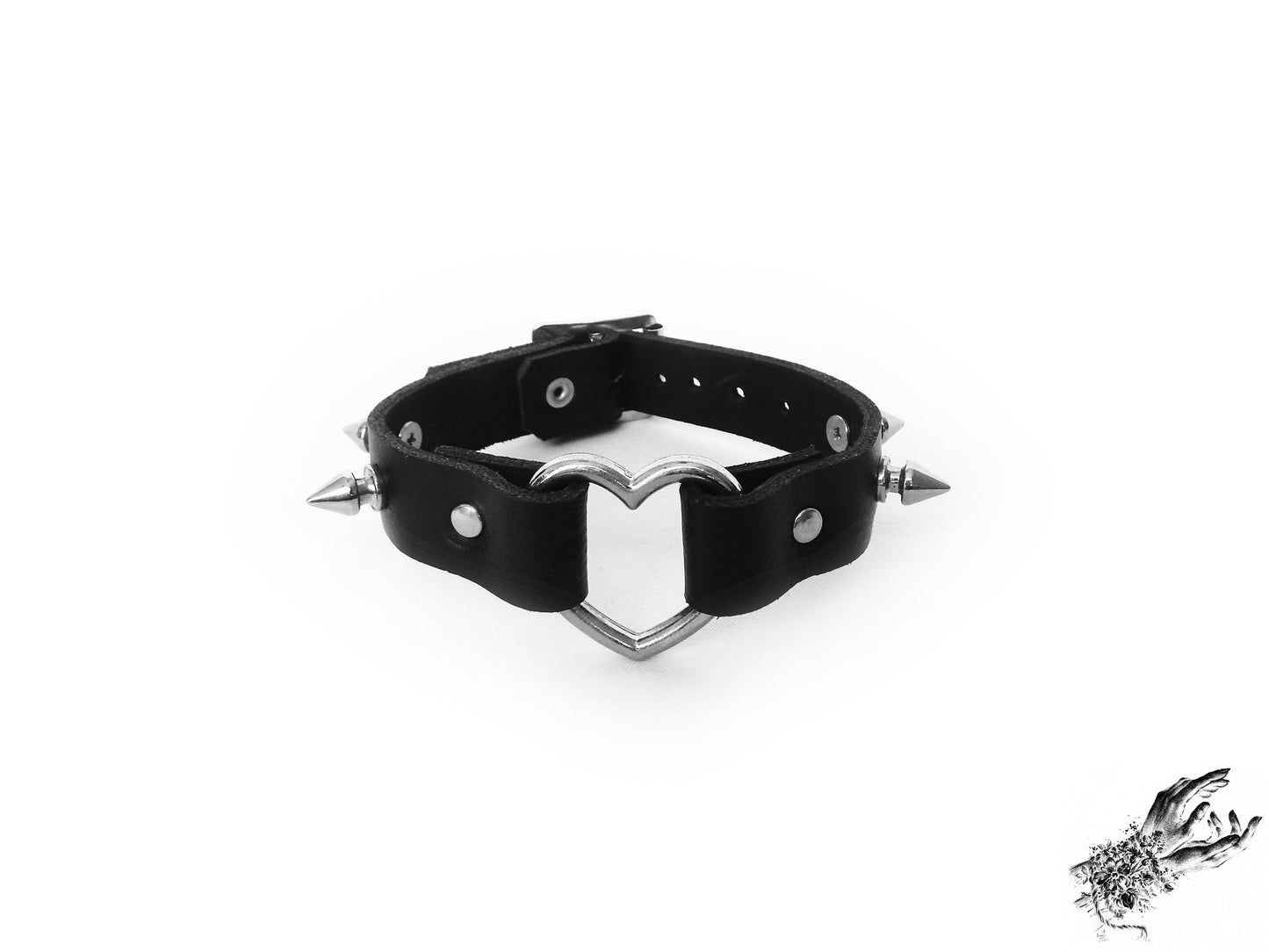 Black studded heart ring wristband, made with genuine leather and stainless steel plated hardware in the UK