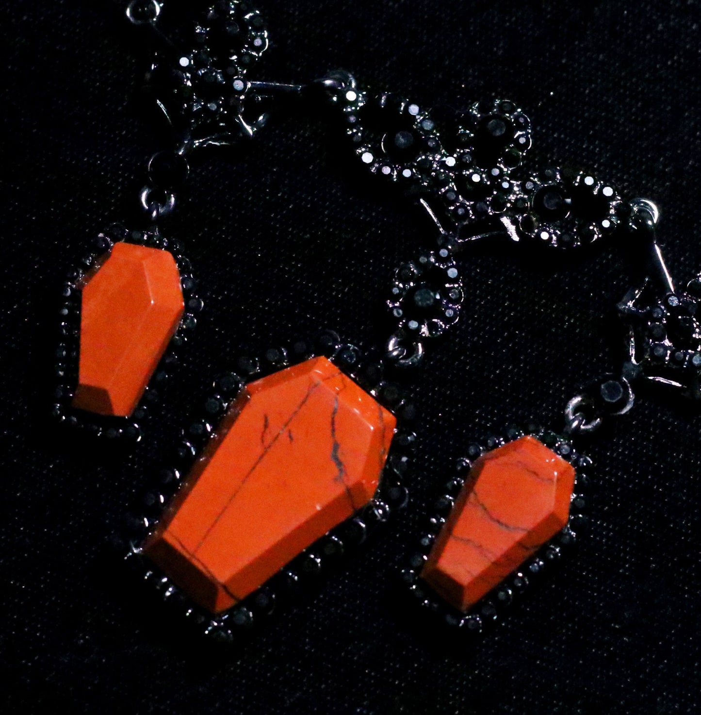 PRE-ORDER - Puvithel Resurrection Earrings, Gunmetal Black Metal Coffin Earrings