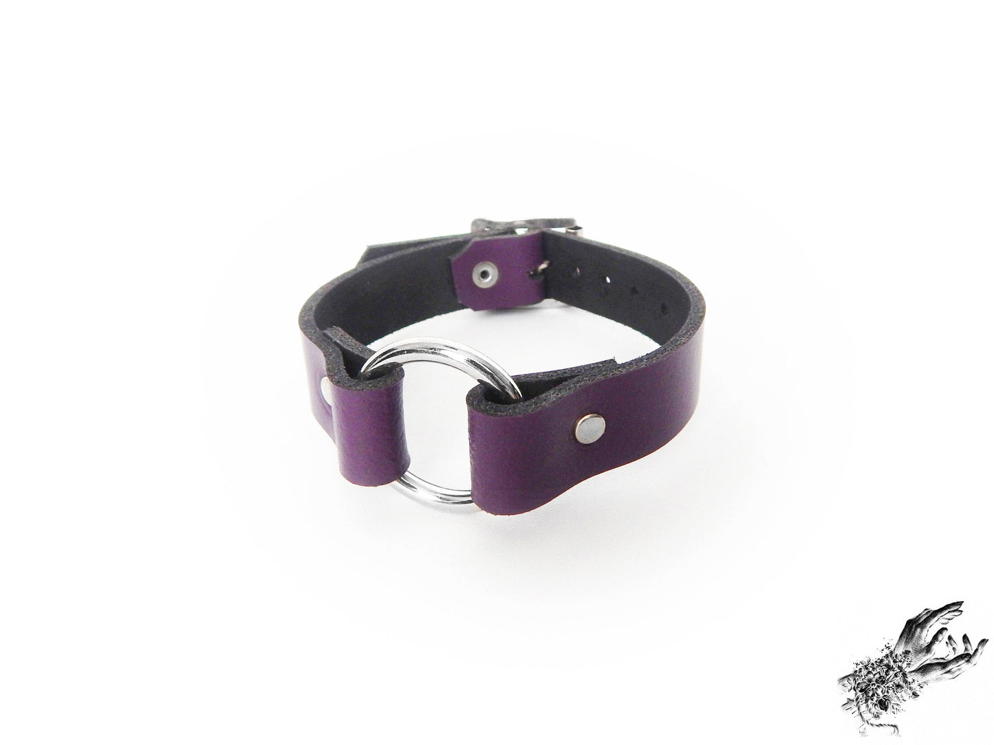 Purple leather O ring wristband made for gothic and alternative fashion in the UK, using genuine leather and stainless steel plated hardware