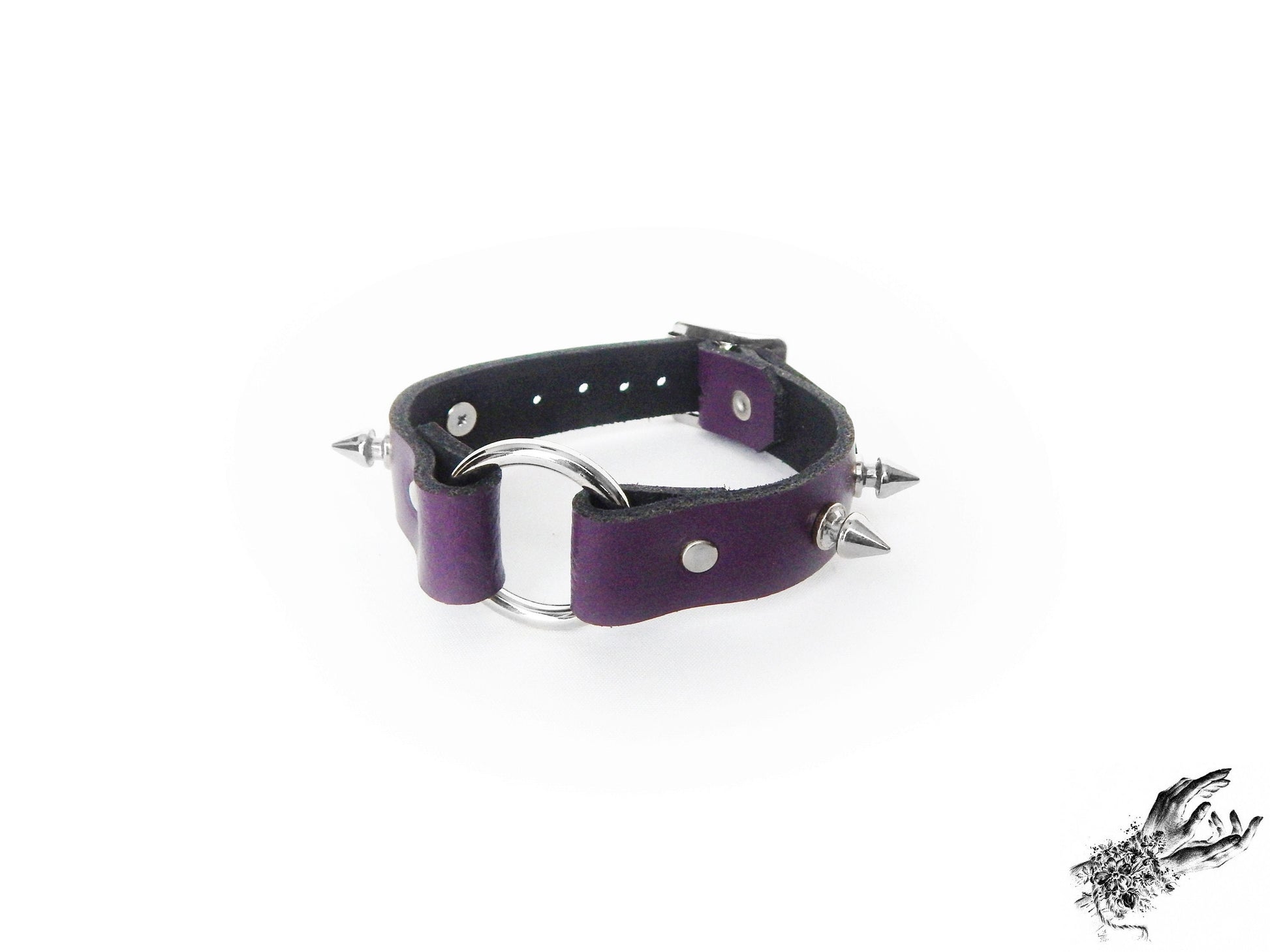 Purple studded O ring wristband made with genuine leather and stainless steel plated hardware in the UK for gothic and alternative fashion