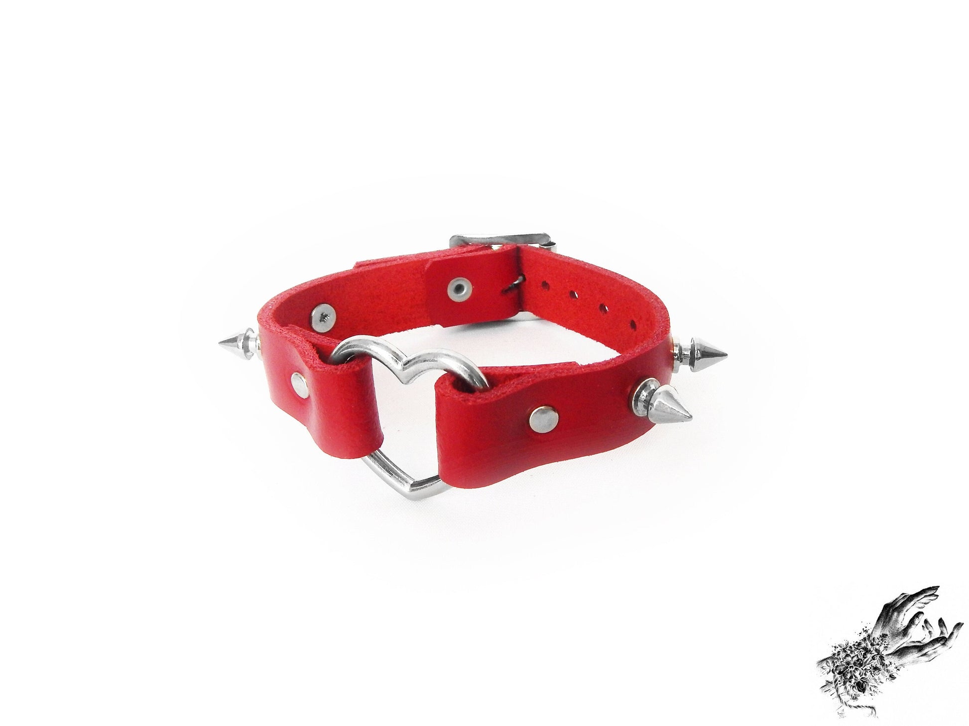 Red studded heart ring wristband, made with genuine leather and bold 13mm spike studs in the UK